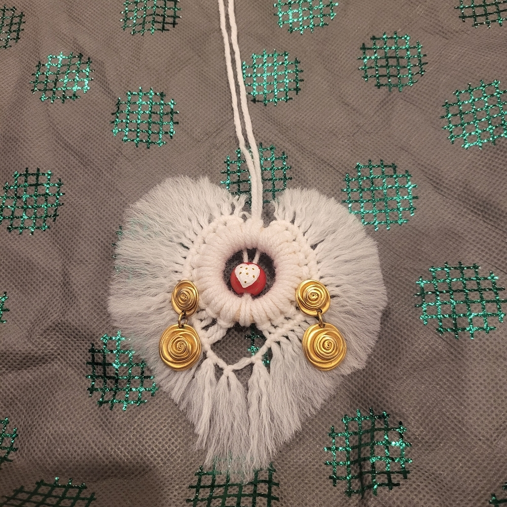 Handmade items Vintage earrings on a handmade macrame heart